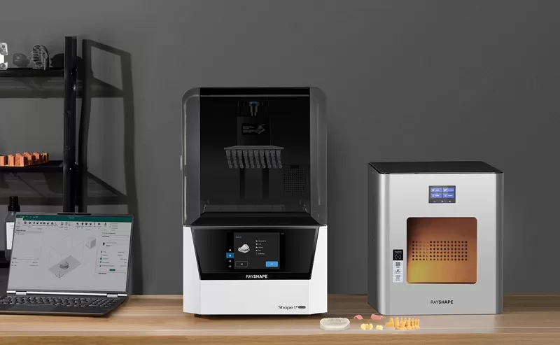 Photo of the Shape 1+ Dental 3d printer and ShapeCure post-processing machine (Credit: RAYSHAPE)